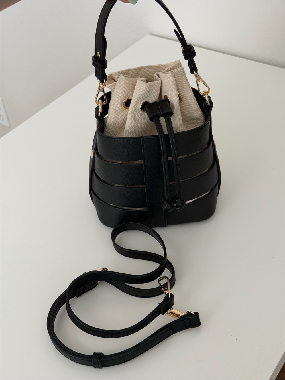 Madison West Black Bucket Bag with Cream Drawstring Insert